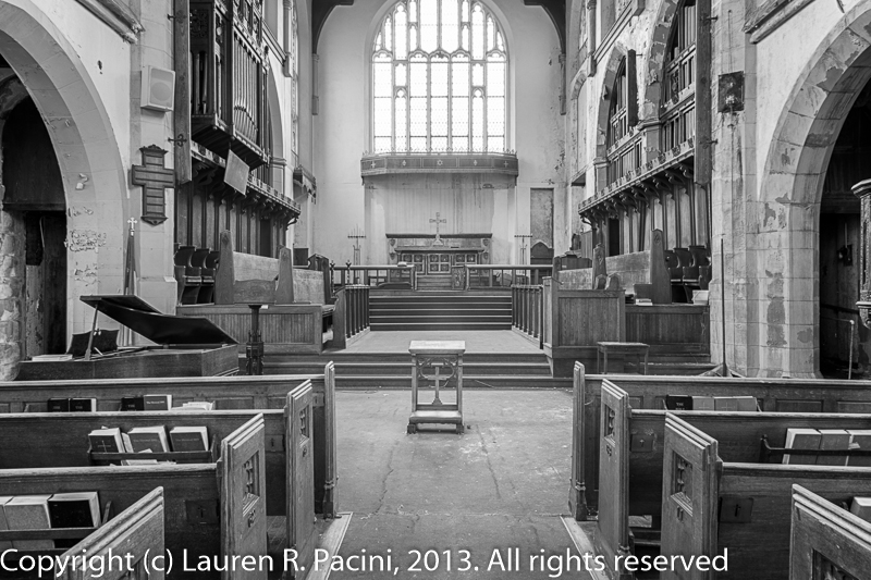 View of the Chancel with Kneeling Bench in the center. Piano and Lectern to the left; Pulpit to the right. Communion Table is out of view on the left.