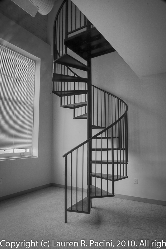 Spiral Staircase leads to Apartment's Second Story