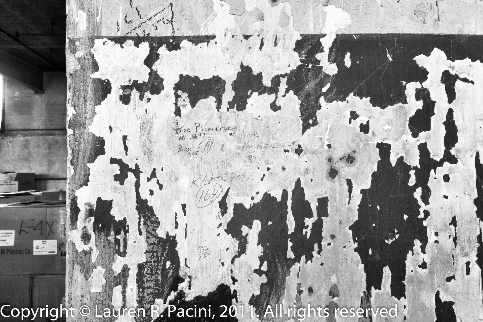 Beneath Peeling Paint is the Names of Workers at the Winton Factory